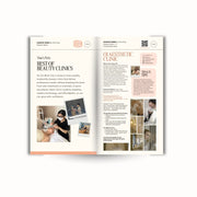 Open magazine or book with beauty clinic recommendations on a white background