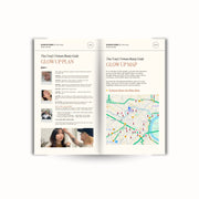 Open book showing a beauty guide with text and a map on a white background